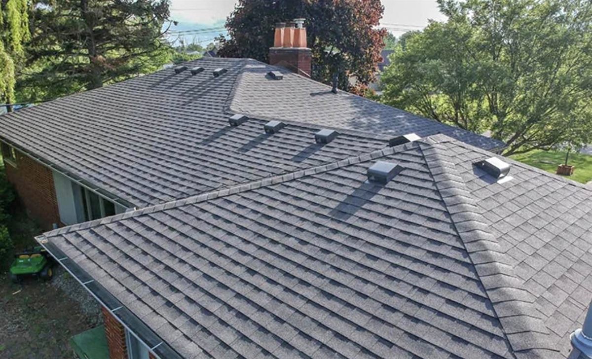 Aerial view of a completed architectural shingle roof